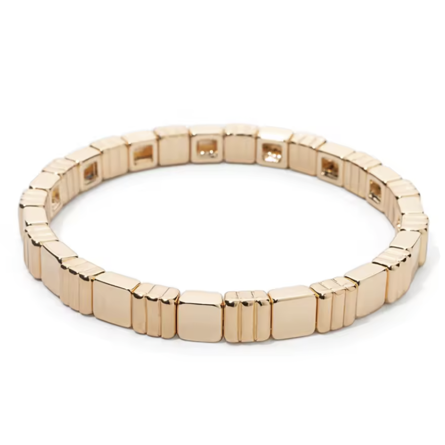 Gold bracelet on a white background