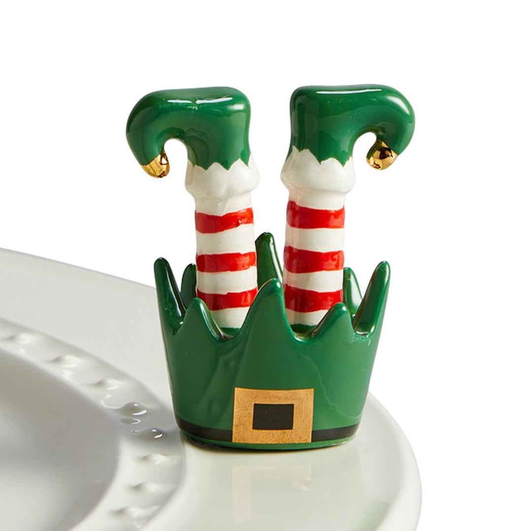 What’s cuter than these little elf feet to celebrate the holidays? not dishwasher safe hand wash only ceramic coordinates with all Nora Fleming pieces