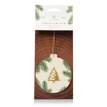 A new spin on a class favorite - this seasonal sachet has been redesigned to add a touch of style and a hint of fragrance to common or surprising spaces. Now with a round shape & classic pine needle design, the warm, comforting scent of Frasier Fir is the perfect stocking stuffer or gift tag.