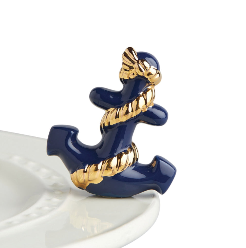 No one does neat new nautical quite like Nora Fleming! This navy anchor is festooned with a gold cord that adds the perfect touch to any base piece!