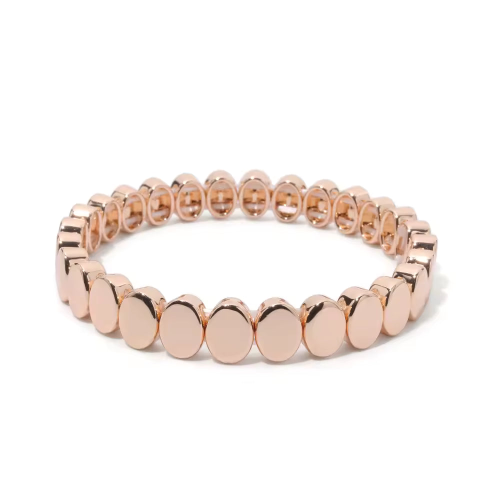 Rose gold bracelet on a white background