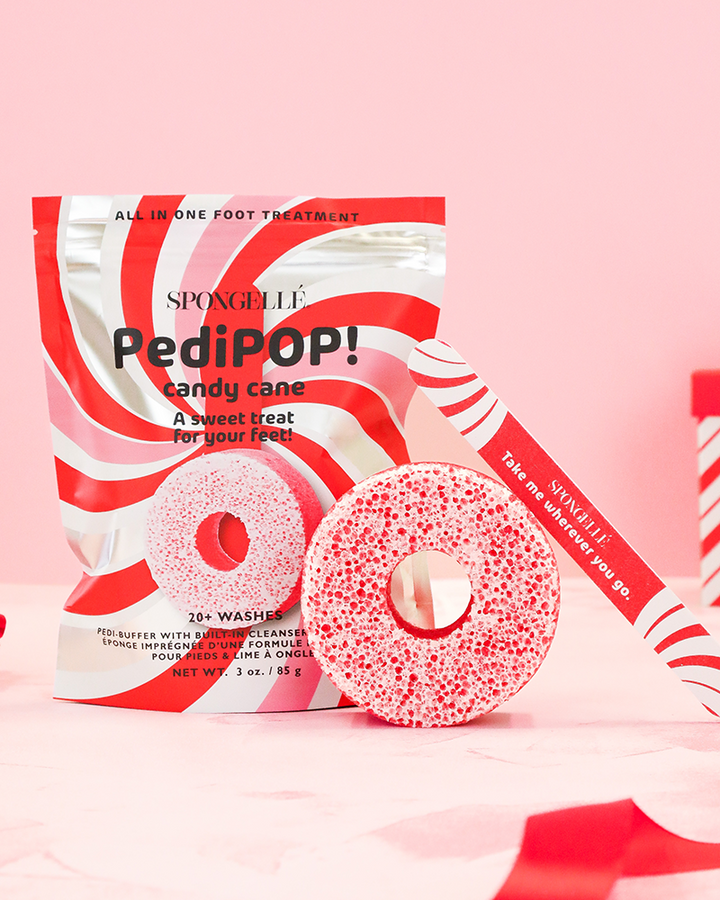 Spongelle PediPOP candy cane foot treatment on a pink background