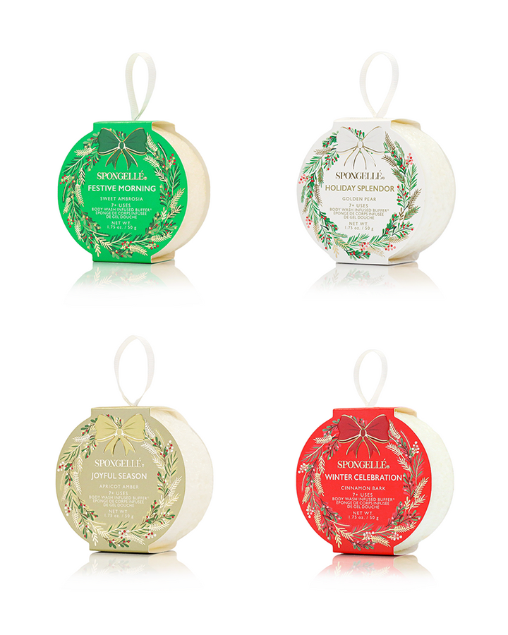 Four Spunelle bath bombs with decorative labels on a white background