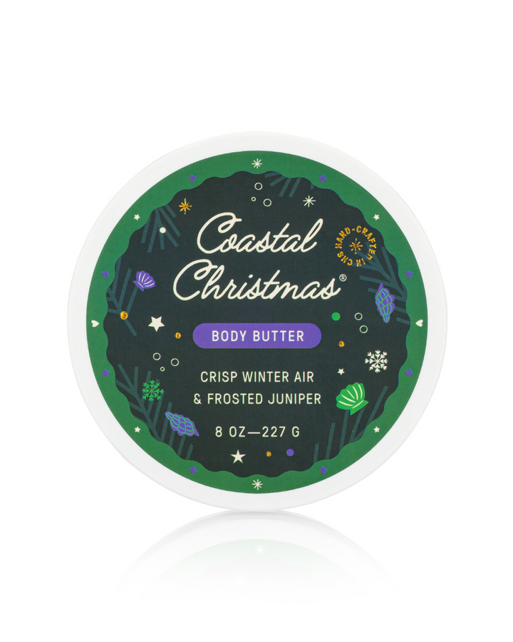 Coastal Christmas body butter container with green label on white background