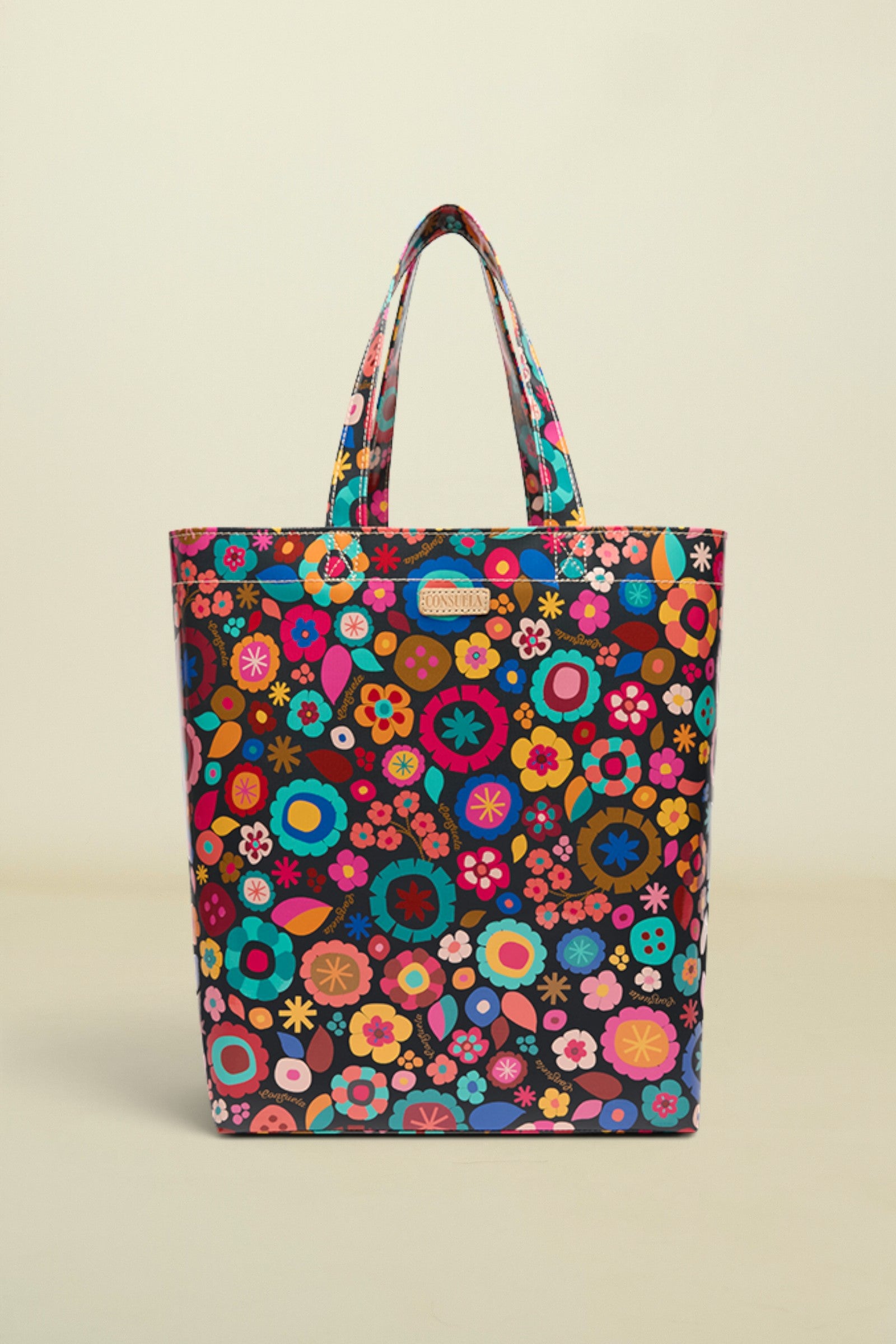 Colorful floral-patterned tote bag on a white background