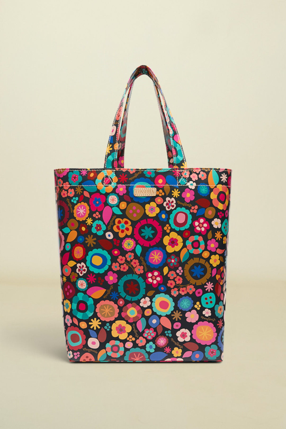 Colorful floral-patterned tote bag on a white background