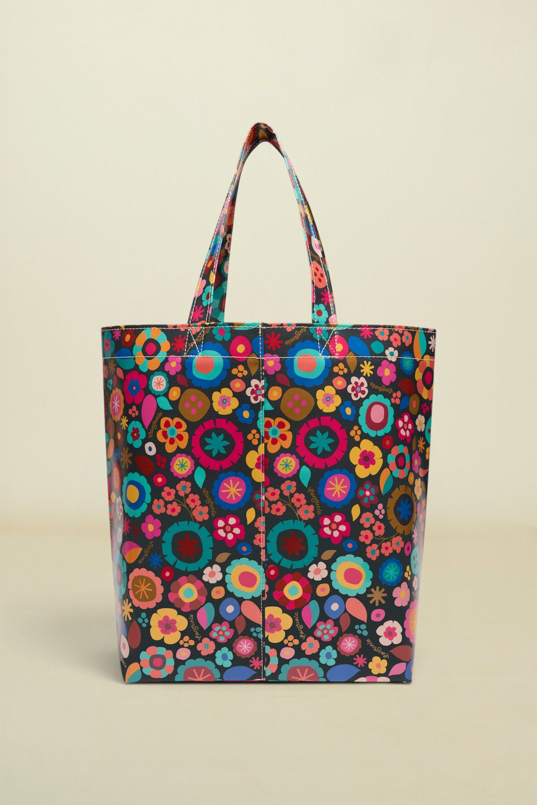 Colorful floral-patterned tote bag on a white background