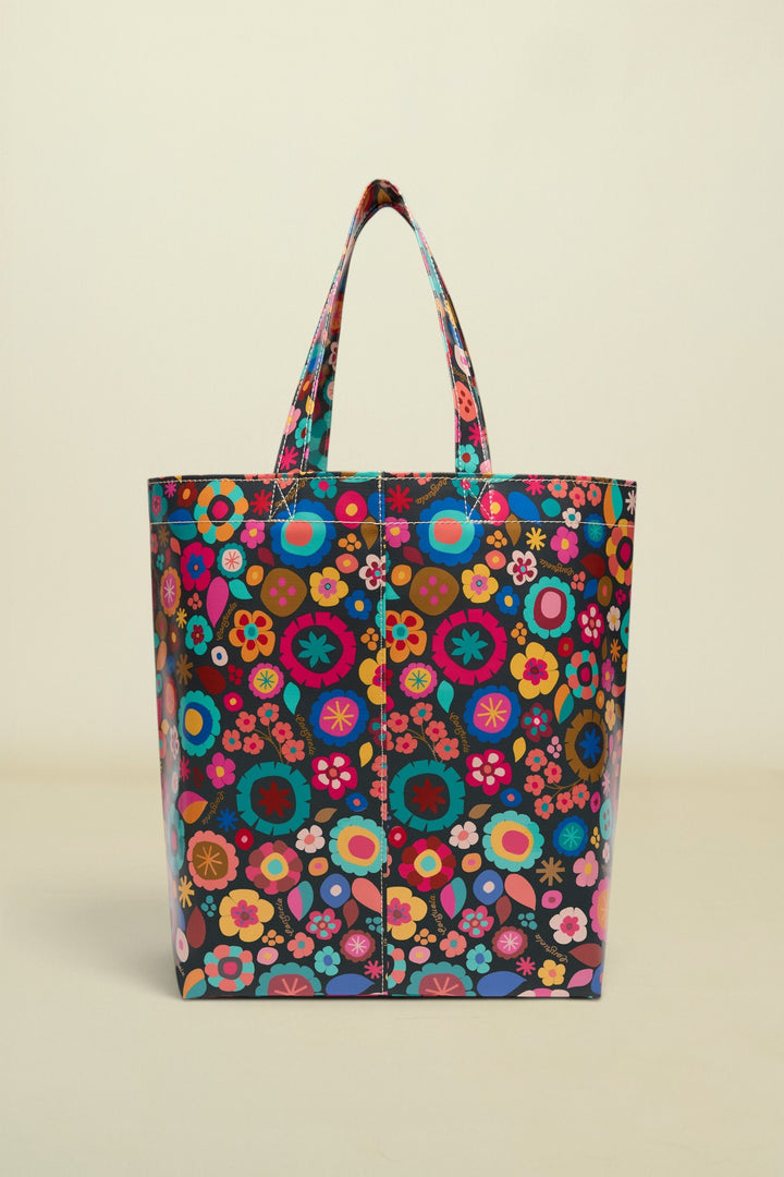 Colorful floral-patterned tote bag on a white background