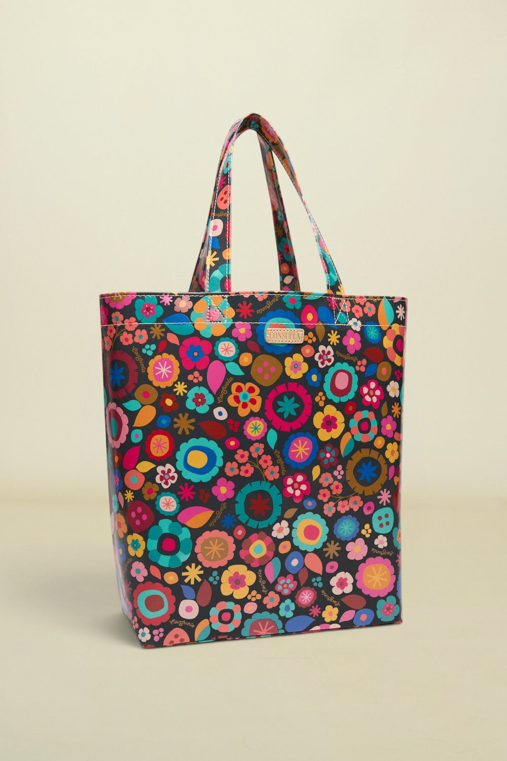Colorful floral-patterned tote bag on a white background