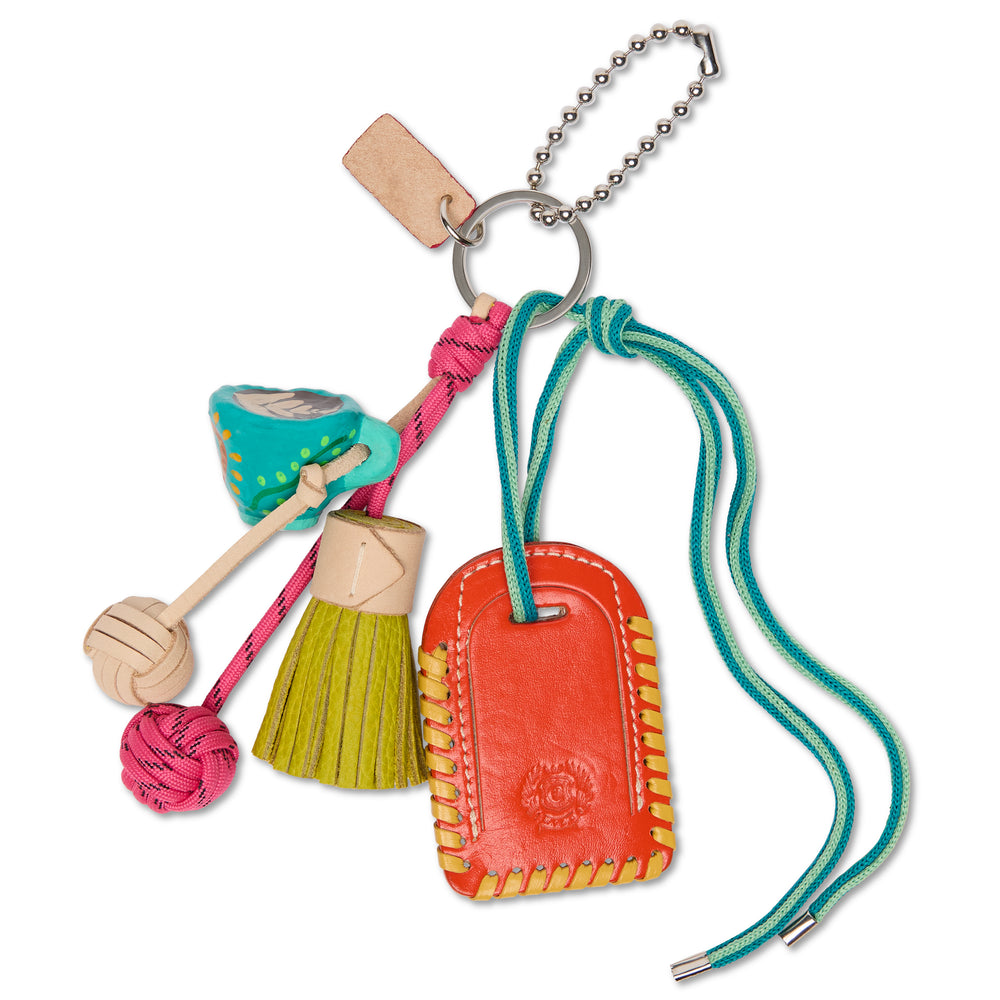 Colorful keychain with various charms on a white background