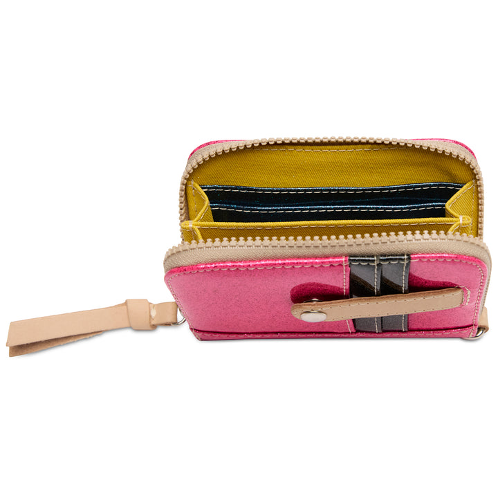 Pink wallet with a strap on a white background