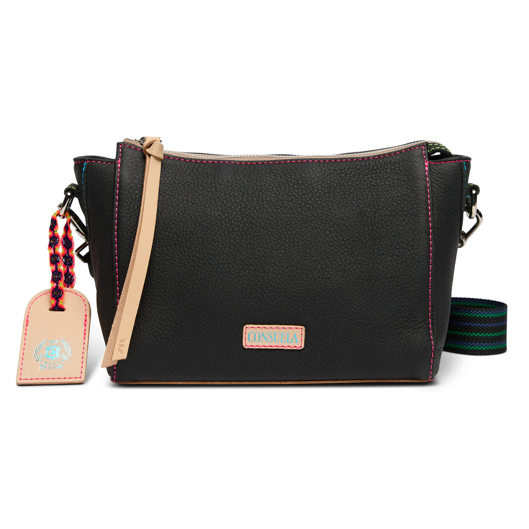 Black leather crossbody bag with a strap and tag on a white background