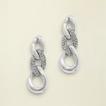 Cleo Pave Link Post Drop Earrings laying on neutral backgorund