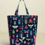 Tote bag with colorful insect pattern on a white background