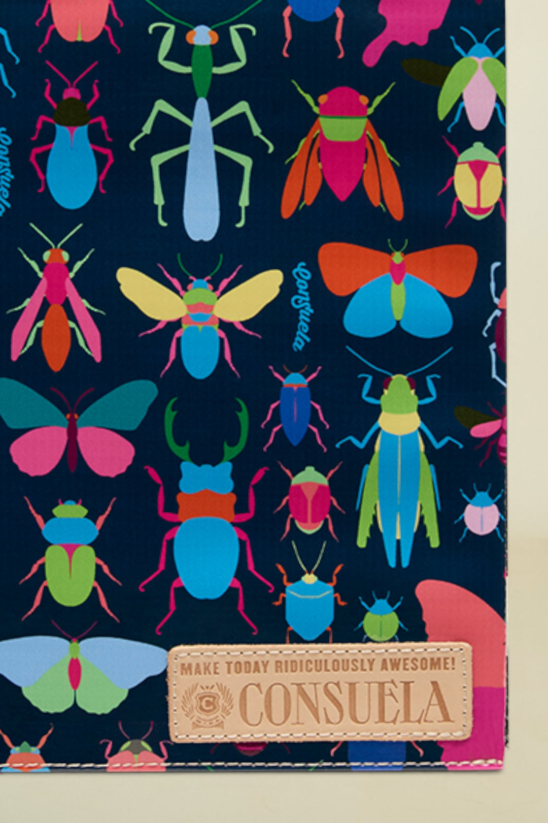 Consuela Gemma Notebook with a dark blue background and colorful insect illustrations