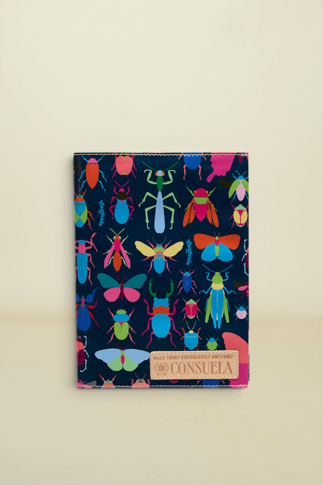 Consuela Gemma Notebook with a dark blue cover and a colorful insect pattern