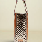 Handbag with geometric pattern on a beige background