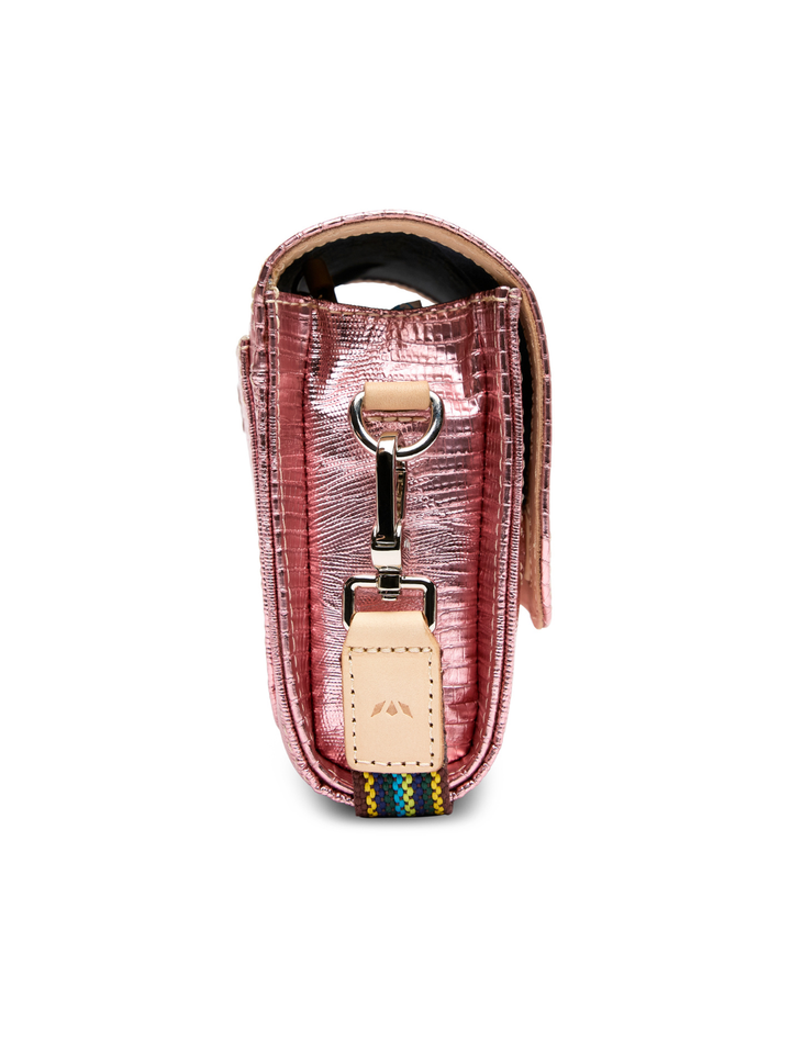 Pink textured handbag with a strap on a white background