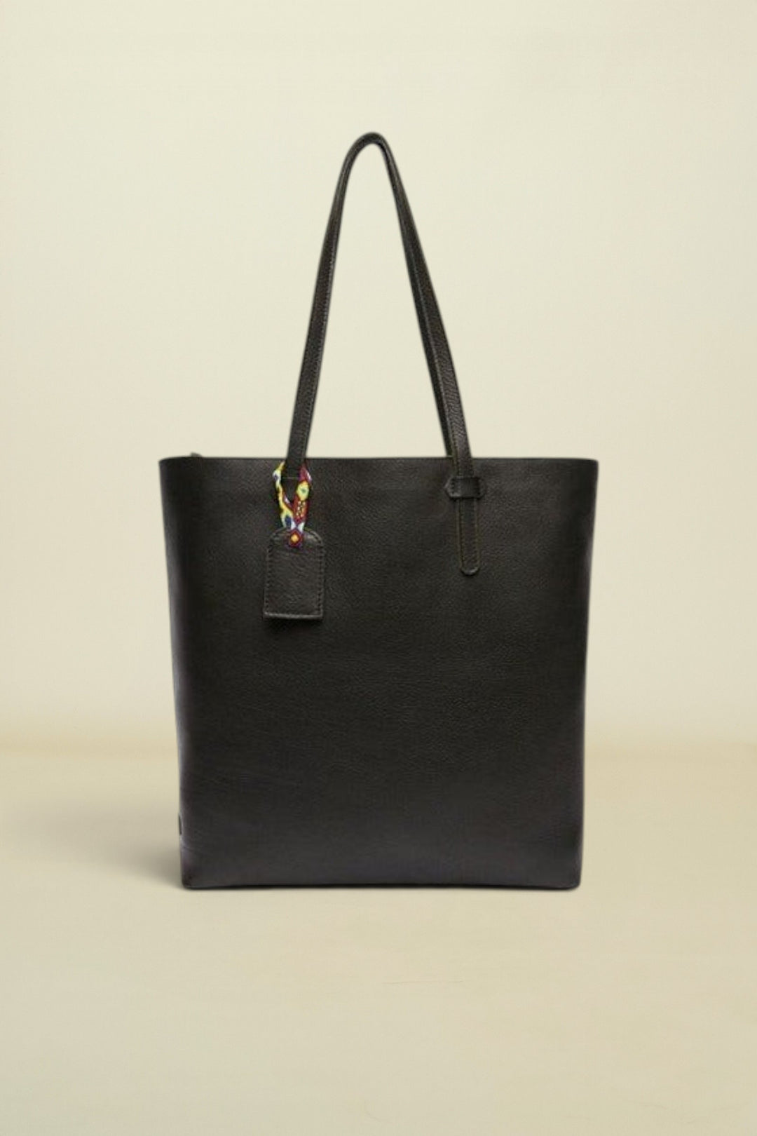 Consuela Evie Market Tote front view of bag with black bag charm