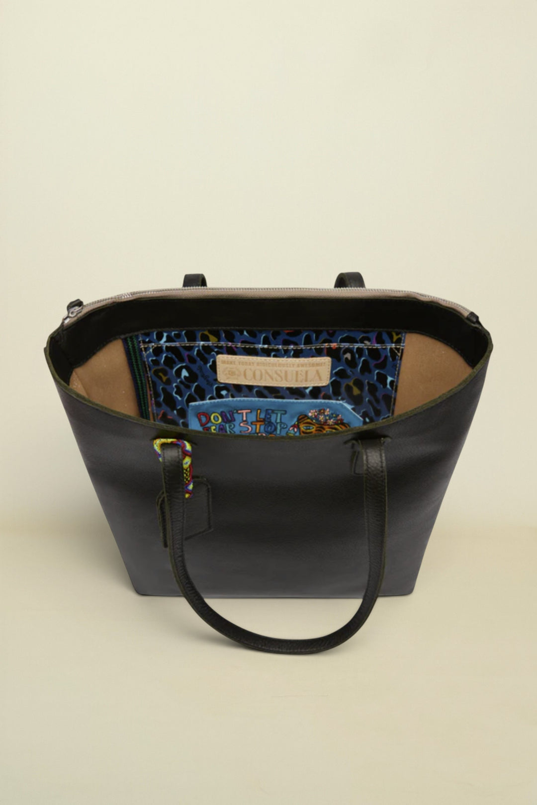 Consuela Evie Market Tote interior view with pocket and consuela diego leather tag