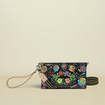 Consuela Rita Uptown Crossbody front view of black vinly with neon embroidered flowers