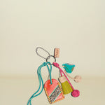 Colorful keychain with decorative elements on a white background