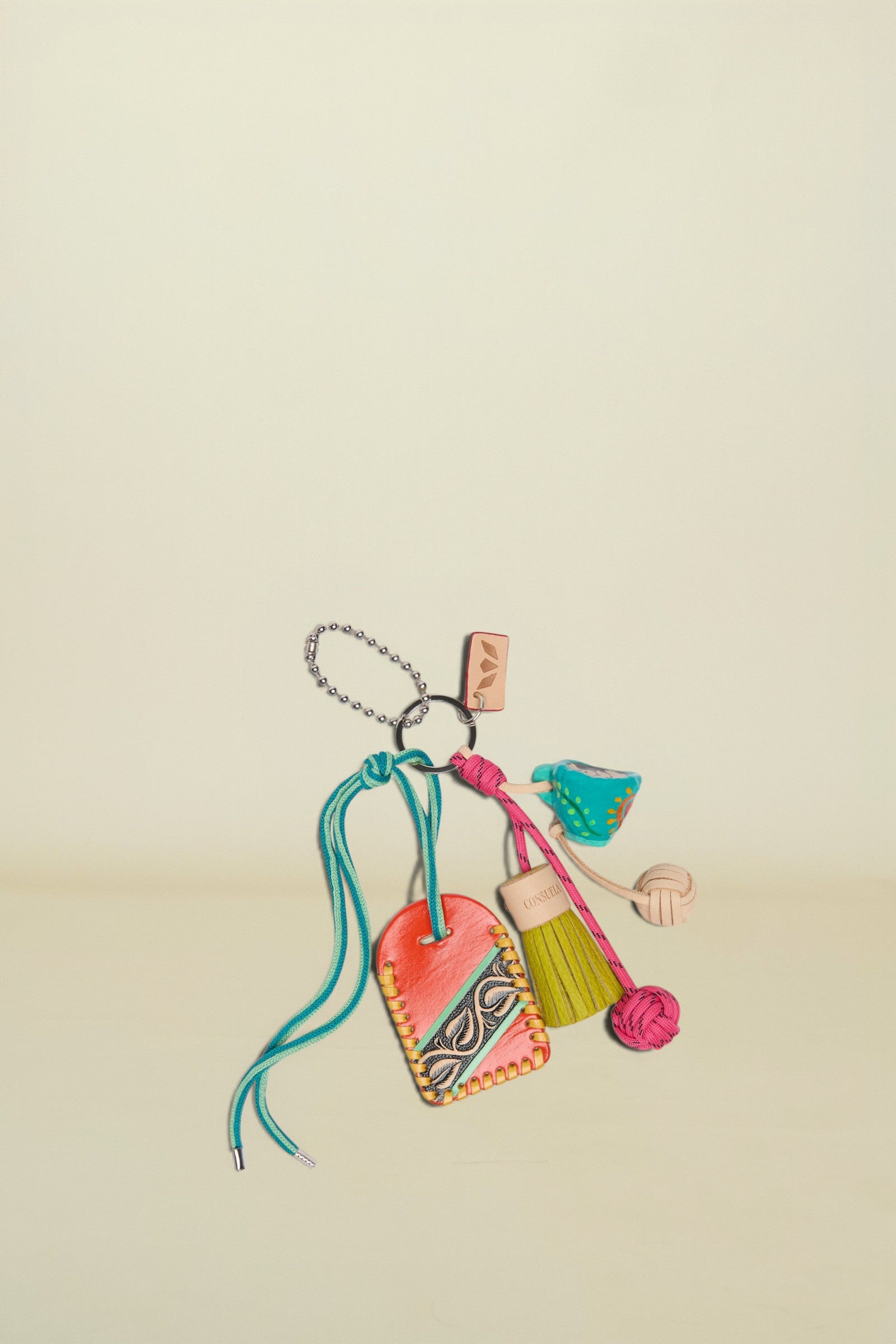 Colorful keychain with decorative elements on a white background