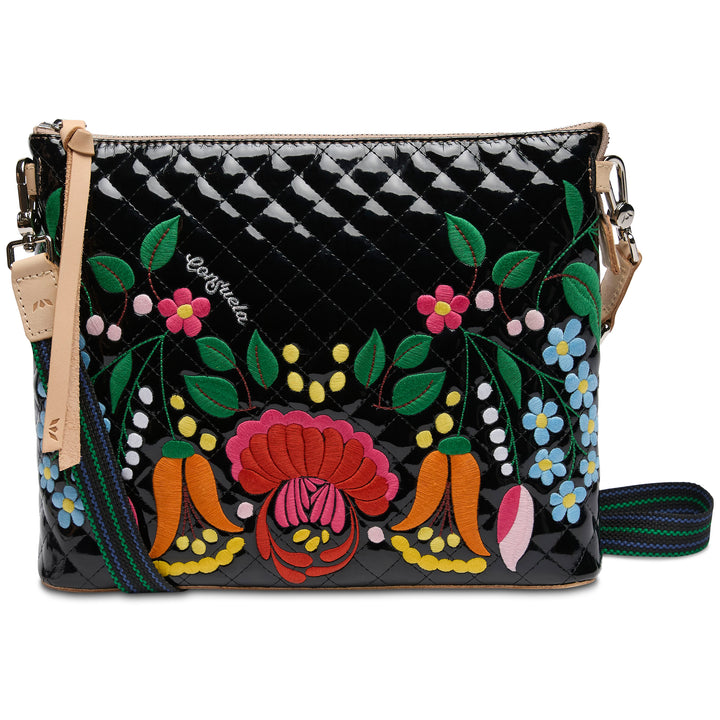 Floral embroidered handbag with a black and white checkered pattern on a white background