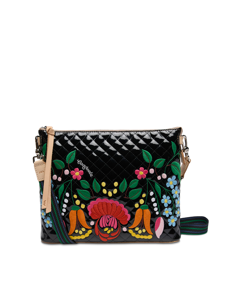 Black handbag with colorful floral embroidery on a white background