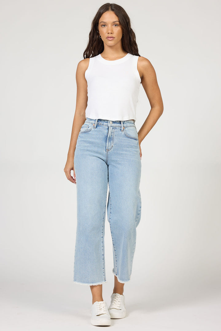 woman wearing white tank and Dear John Sunset Blues Holly Jean