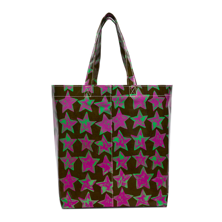 Tote bag with pink and green star pattern on a brown background