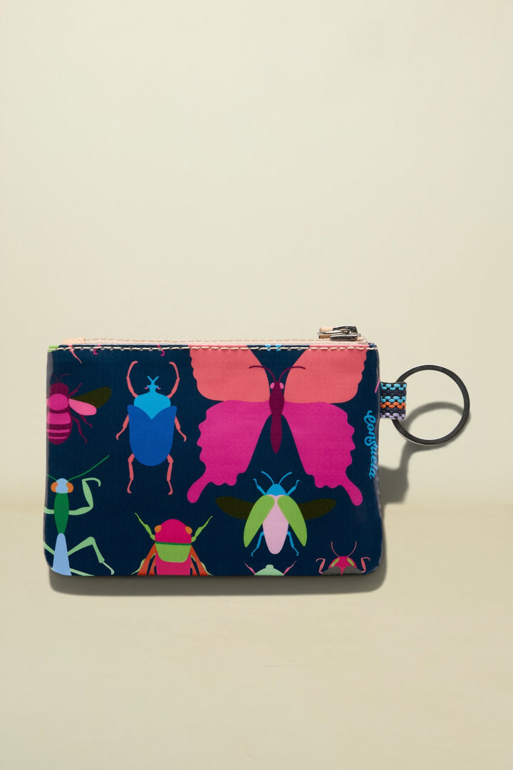 Small pouch with colorful insect design on a beige background
