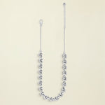 Silver chain necklace on a white background