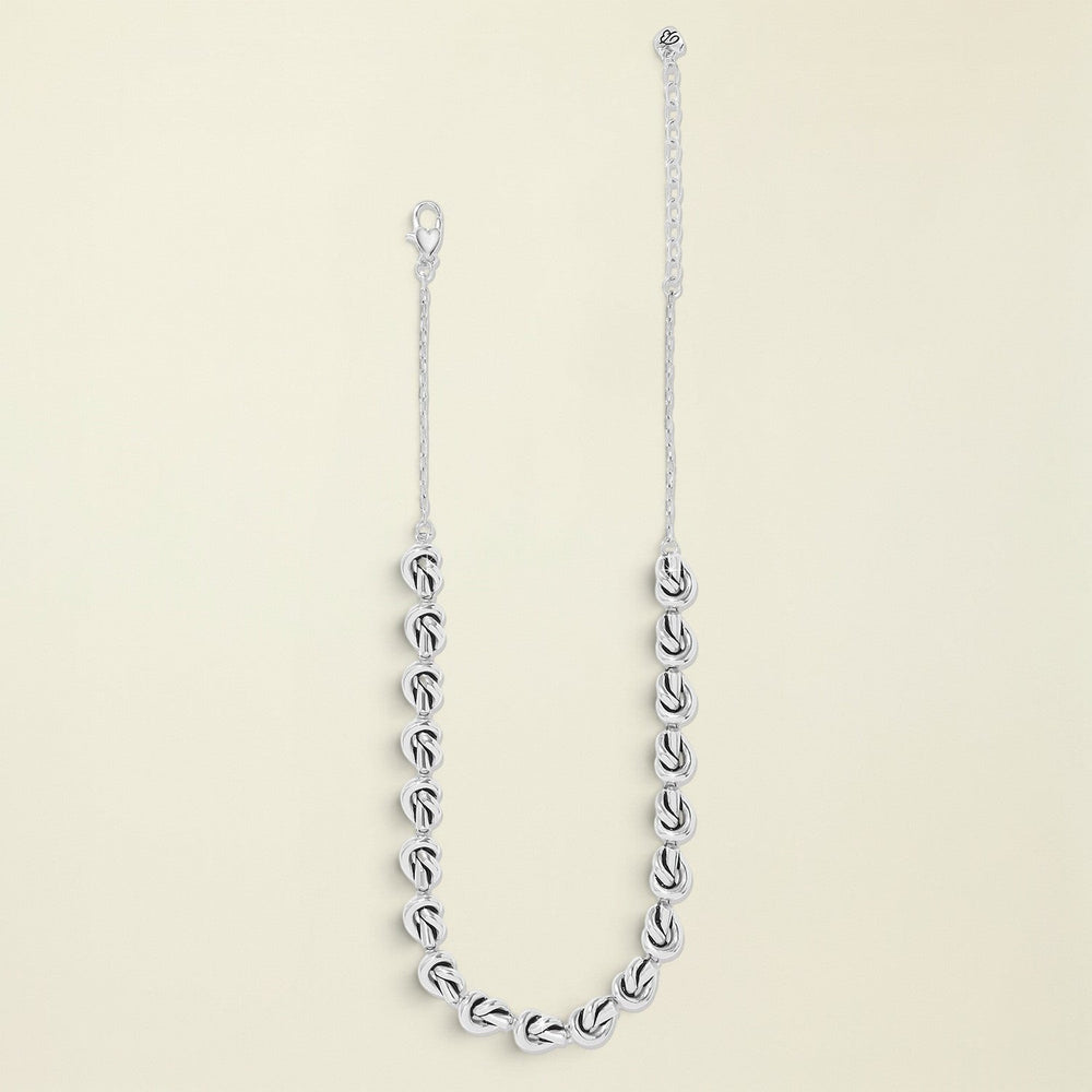 Silver chain necklace on a white background