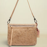 Beige floral-patterned handbag with a strap on a white background
