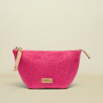 Pink glittery pouch with gold zipper on a white background