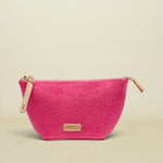 Pink pouch with beige zipper and visible brand logo on a white background