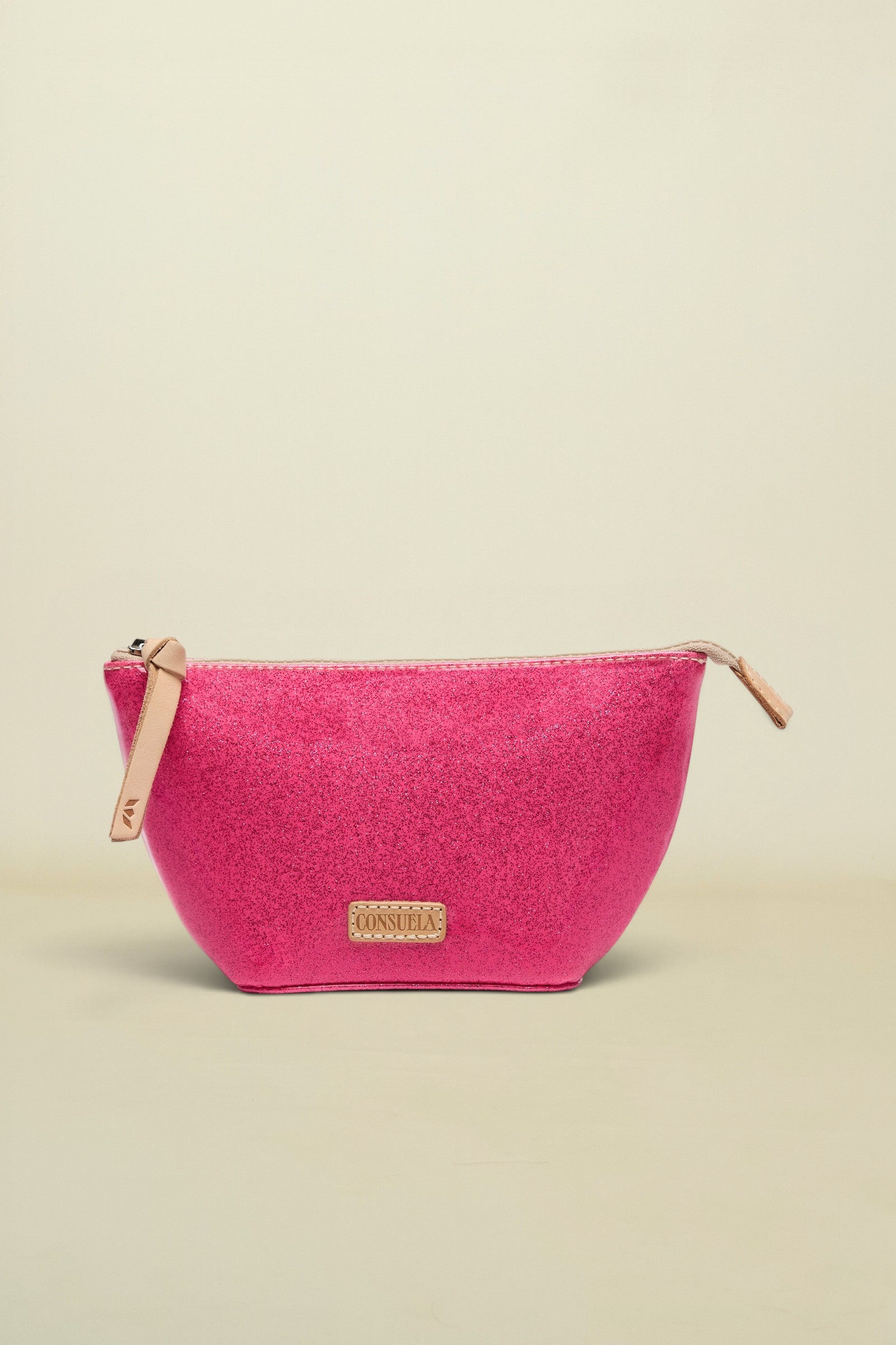 Pink pouch with beige zipper and visible brand logo on a white background