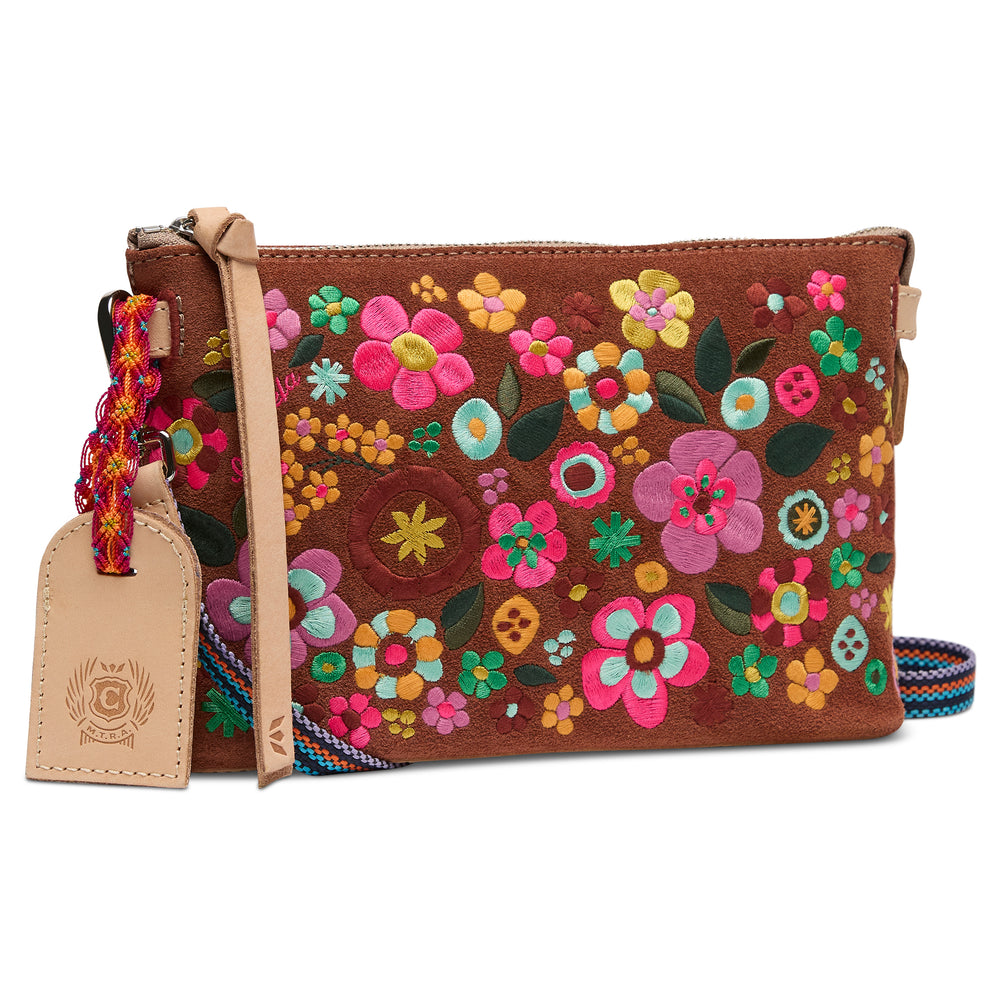 Brown leather clutch with colorful floral embroidery on a white background