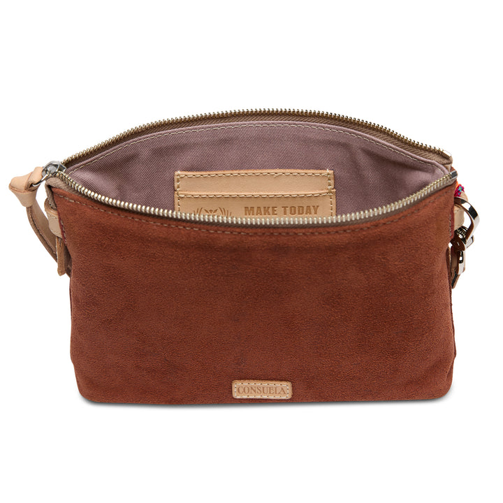 Brown leather bag with visible brand name on a white background