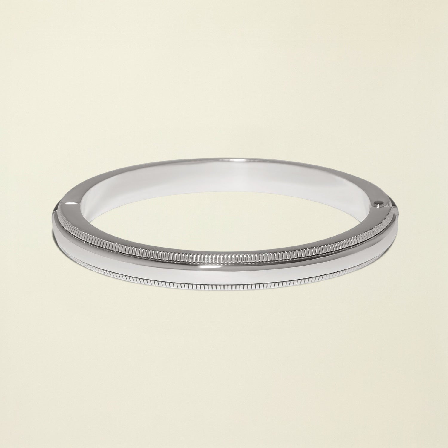 Silver metal ring on a white background