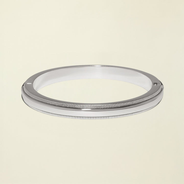 Silver metal ring on a white background