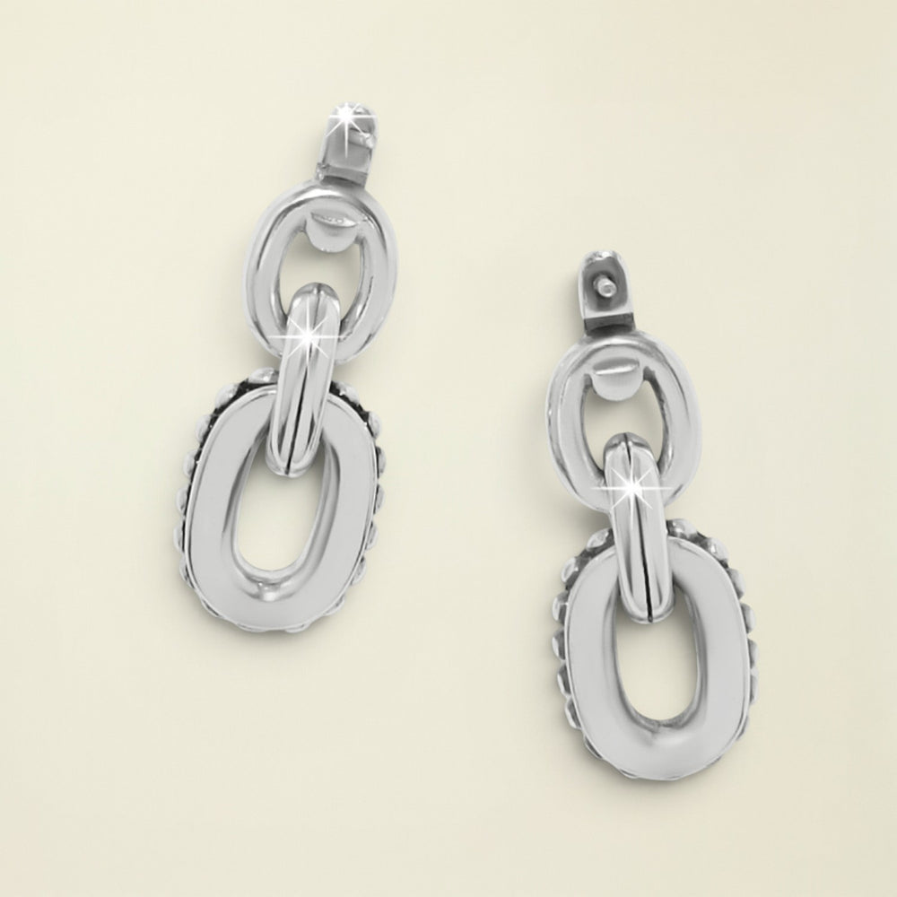 Pair of silver chain-link earrings on a white background