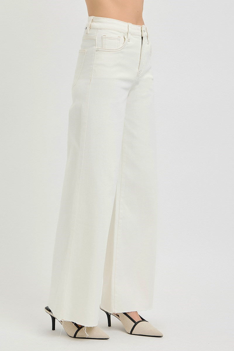 side view of woman wearing Risen Cream Wide Leg Jeans
