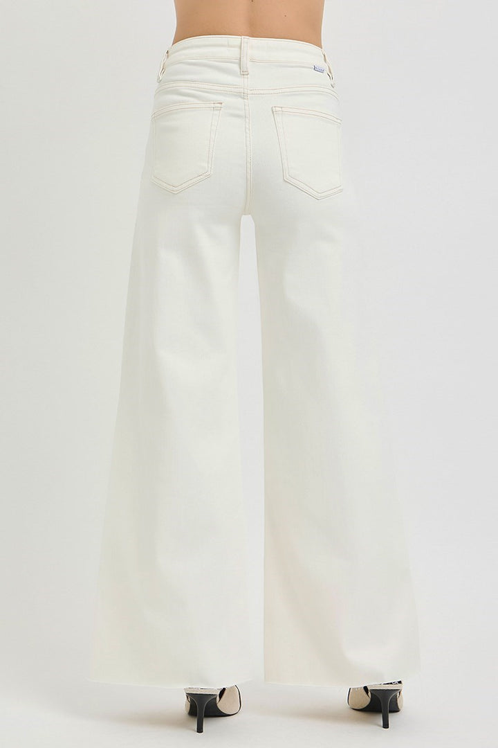 back view of a woman wearing Risen Cream Wide Leg Jeans