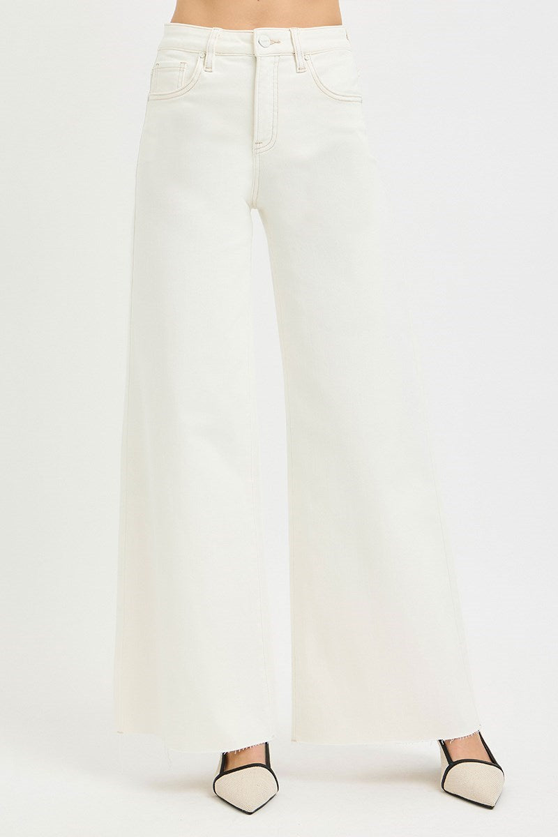 front detailed view of woman wearing Risen Cream Wide Leg Jeans