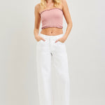 woman wearing pink tank top and Risen White Mid Rise Ankle Barrel Jean