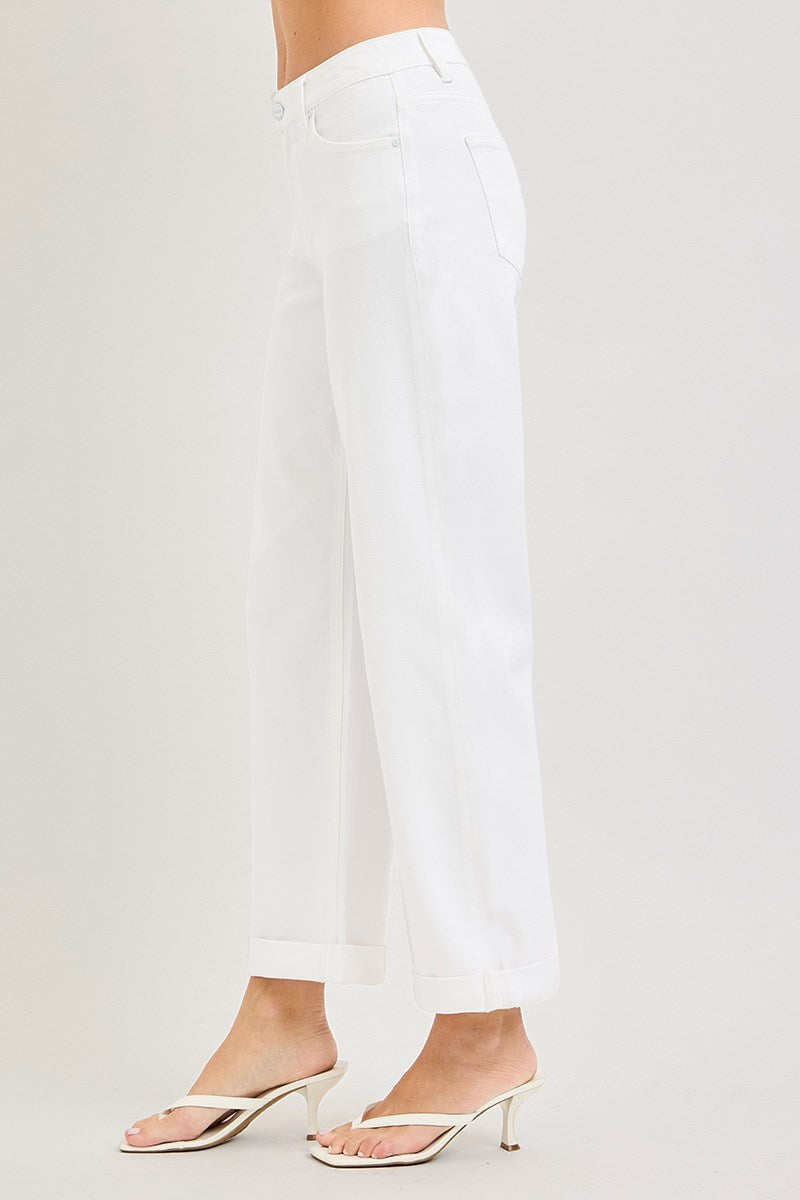 side view of woman wearing Risen White Mid Rise Ankle Barrel Jean