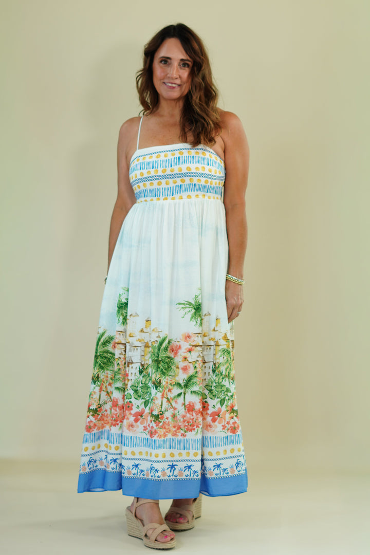 Woman wearing a floral dress with a white background