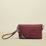 Maroon cork wallet with a strap on a white background